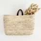 Panier mural en feuilles de palmier avec anse en cuir